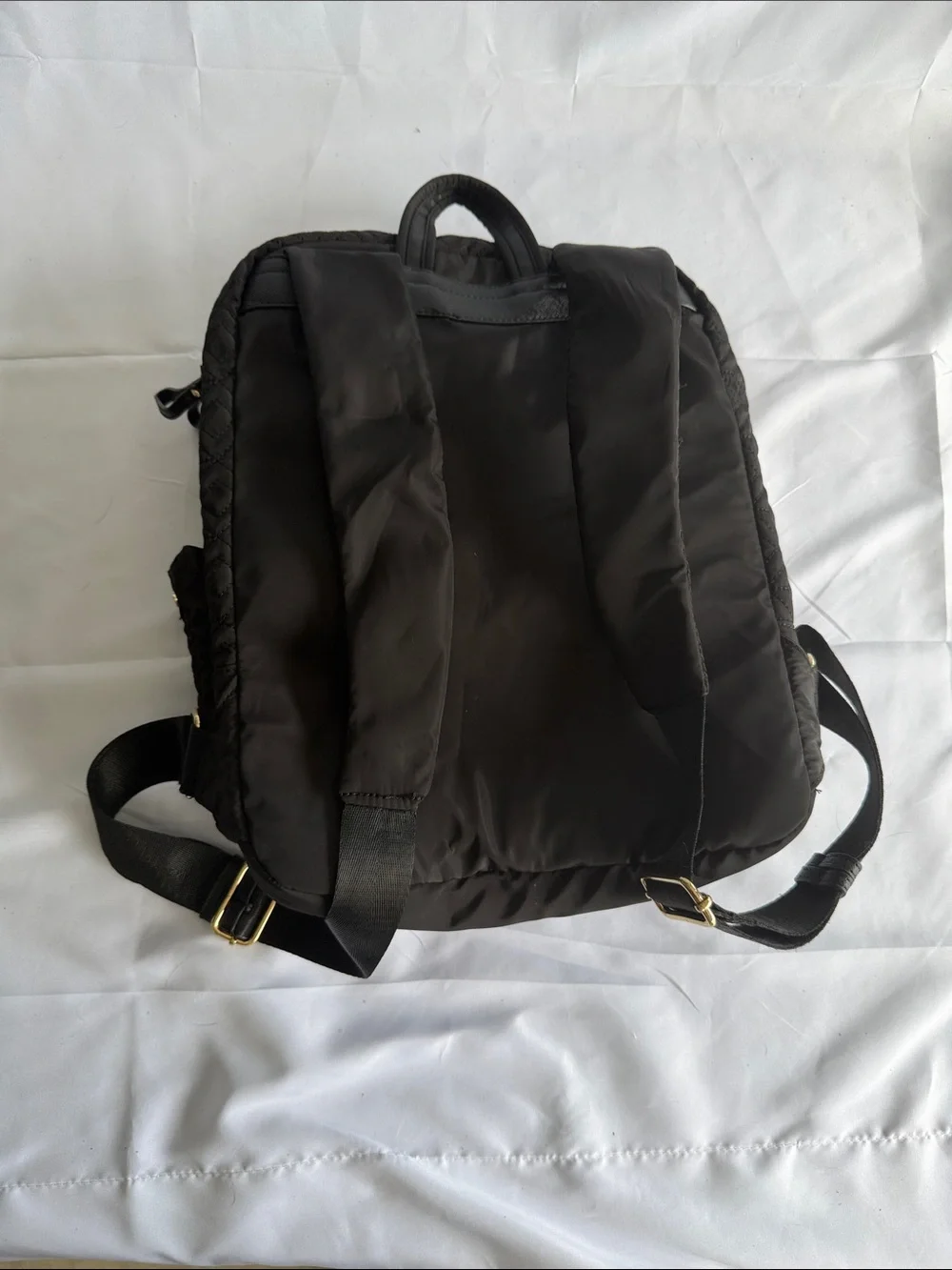 Adrienne Vittadini Black Quilted Backpack with Gold Accents